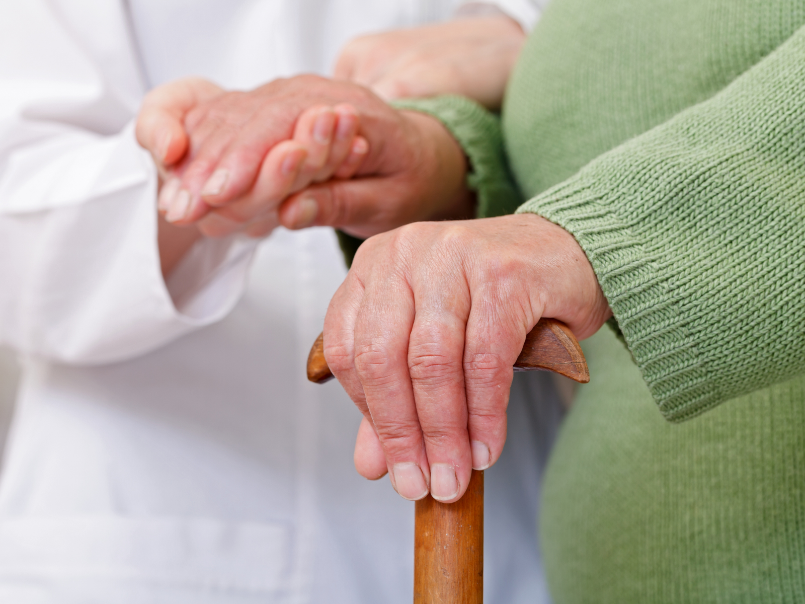 Live-in caregiver sharing morning routine with a client at home